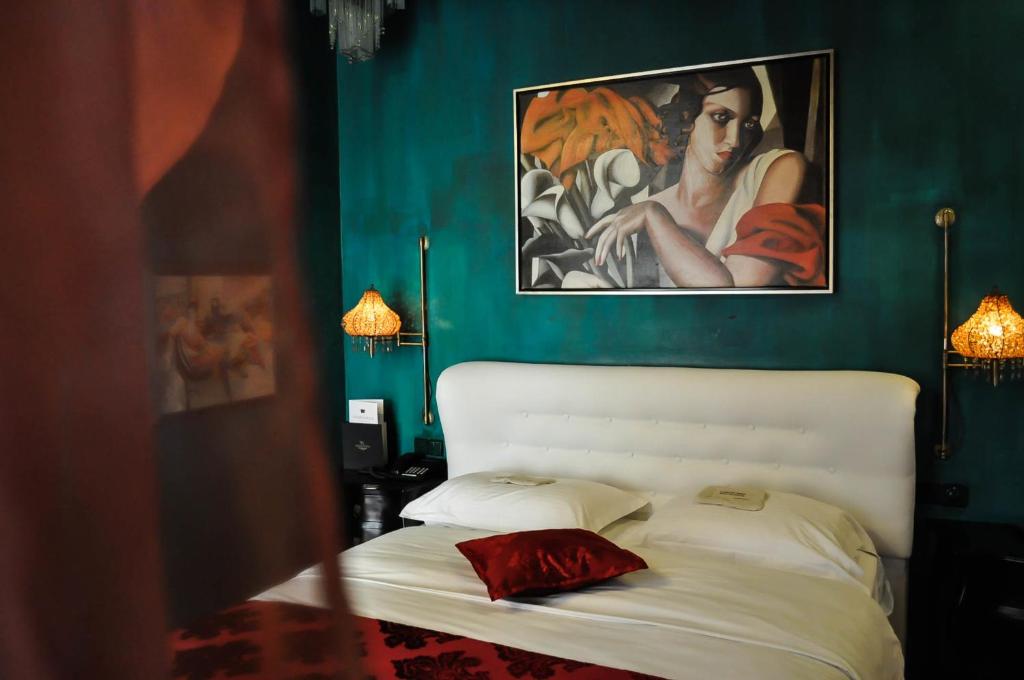 Letto o letti in una camera di Andromeda Hotel Thessaloniki