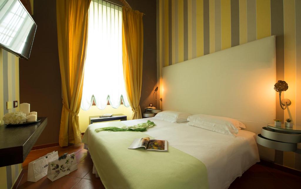 Posteľ alebo postele v izbe v ubytovaní Hotel De La Pace, Sure Hotel Collection by Best Western