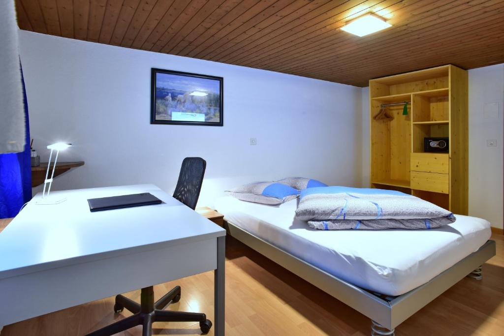 Postel nebo postele na pokoji v ubytování Hotel Freihof