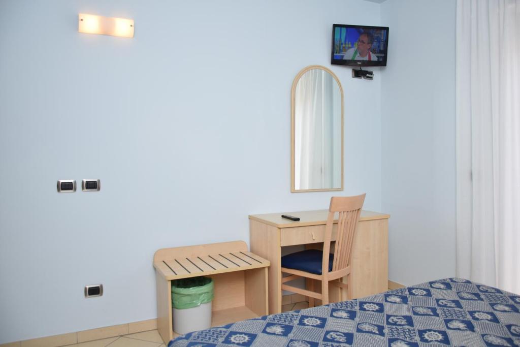 TV a/nebo společenská místnost v ubytování Hotel Antares
