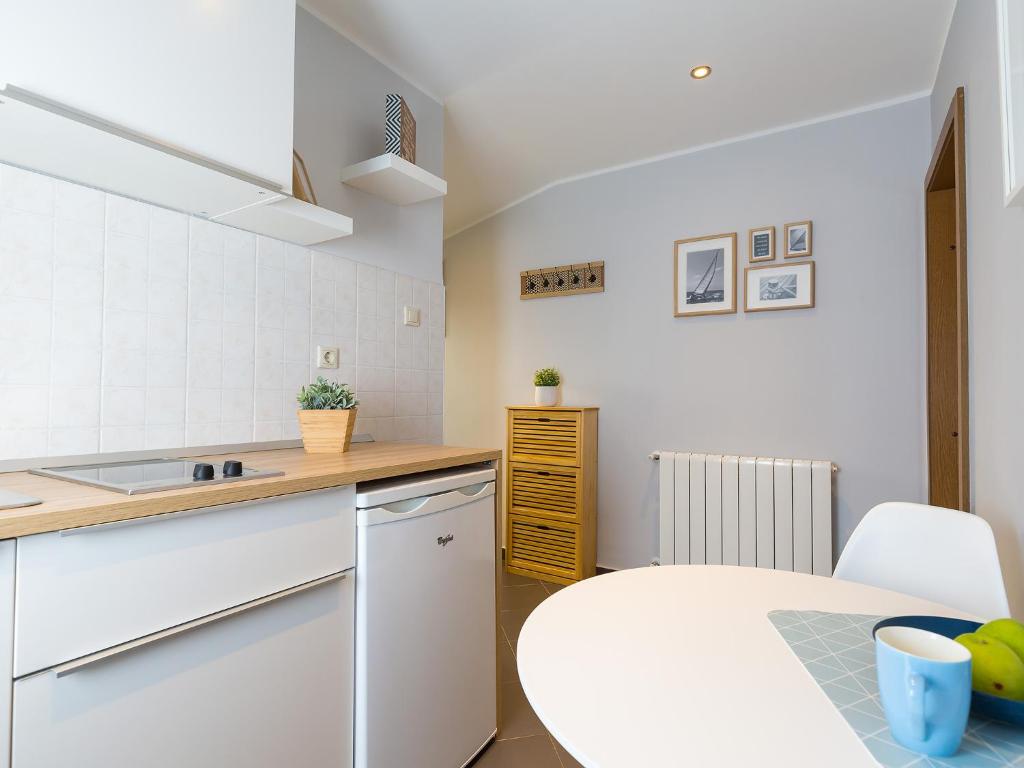 Kuhinja oz. manjša kuhinja v nastanitvi Cosy studio apartment Poreč