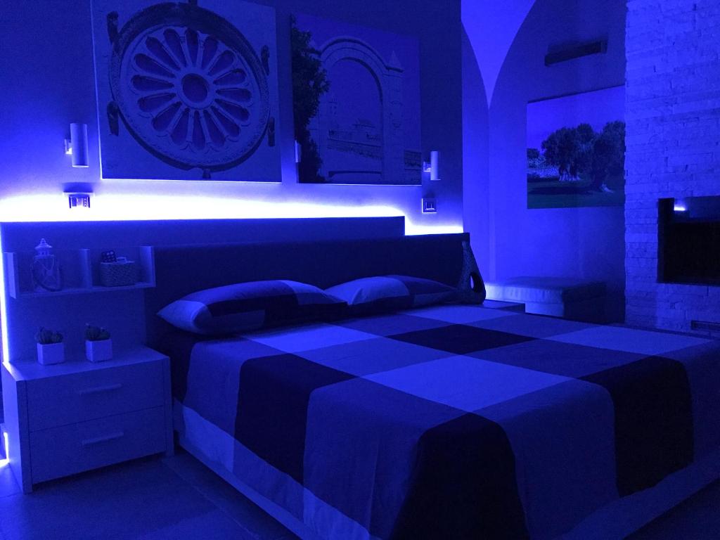 Postel nebo postele na pokoji v ubytování OroVerde Rooms & Suite nel cuore di Trani
