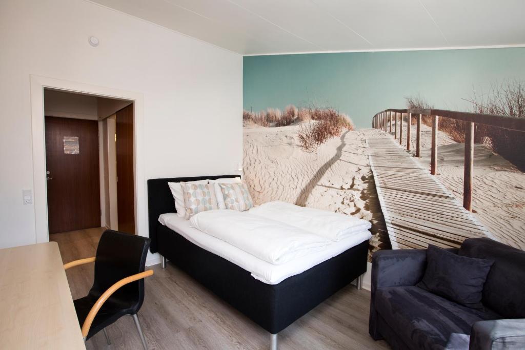 Postel nebo postele na pokoji v ubytování Hotel Hedegaarden