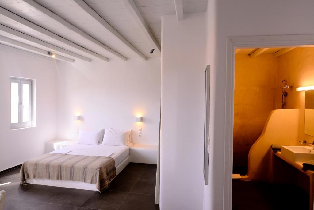 Postel nebo postele na pokoji v ubytování Rizes Hotel