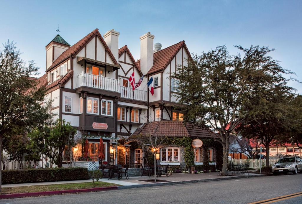 a large house on the corner of a street at Mirabelle Inn & Restaurant in Solvang