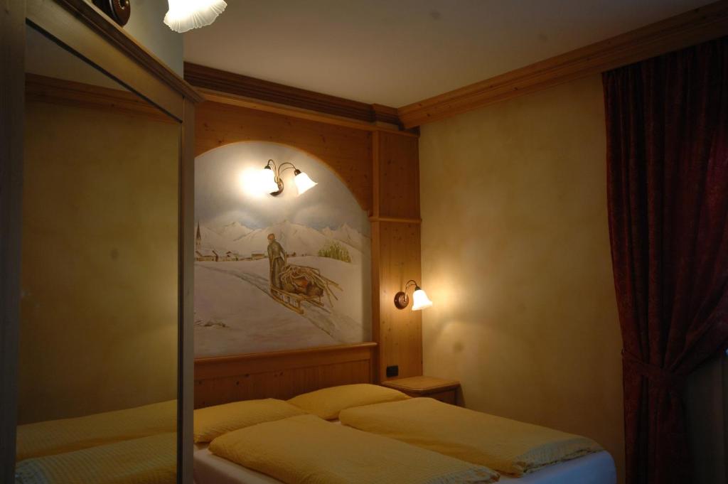 Postel nebo postele na pokoji v ubytování Hotel La Tea