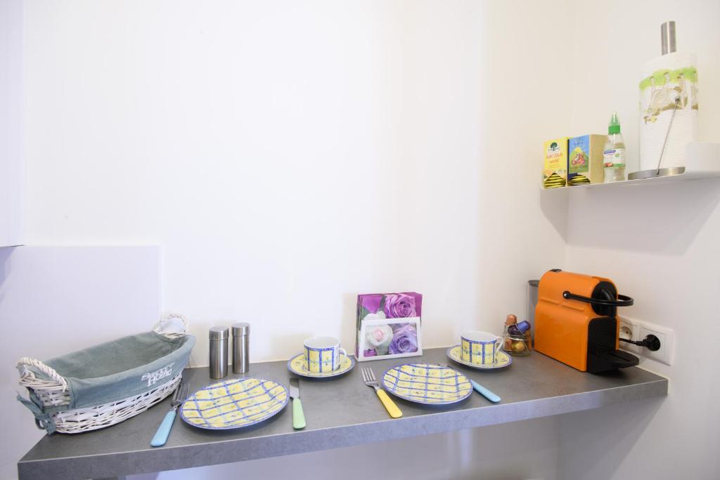 Kuchyň nebo kuchyňský kout v ubytování Design Apartment - Centrally located