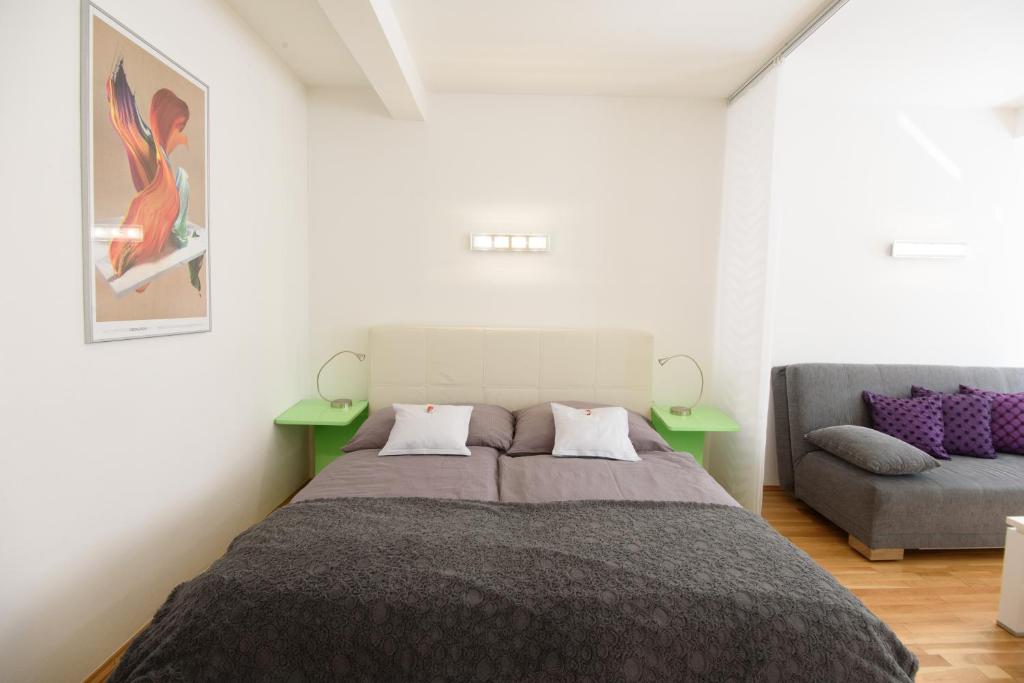 Postel nebo postele na pokoji v ubytování Design Apartment - Centrally located