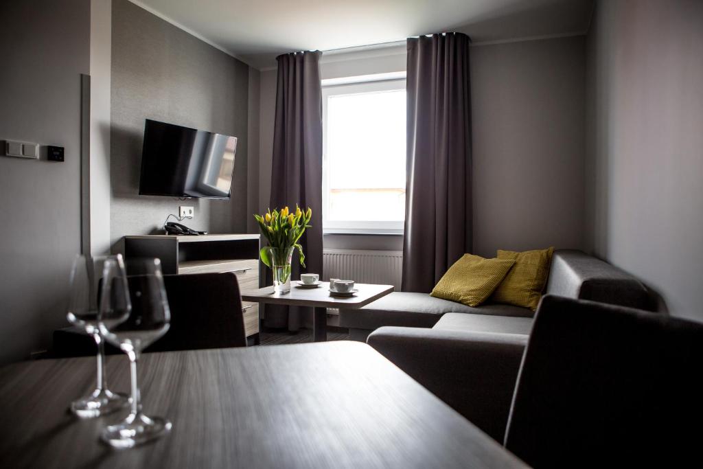 TV a/nebo společenská místnost v ubytování Hotel Mazurek