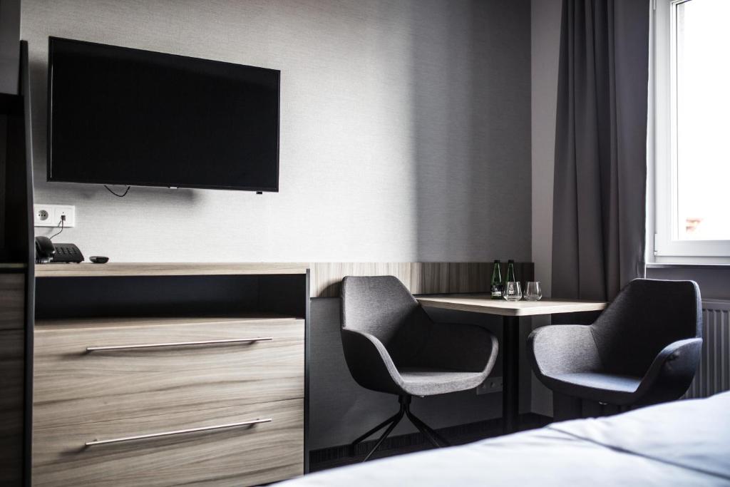 TV a/nebo společenská místnost v ubytování Hotel Mazurek