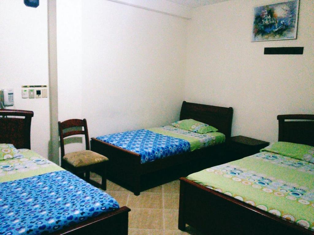 Postel nebo postele na pokoji v ubytování Hotel Murcia