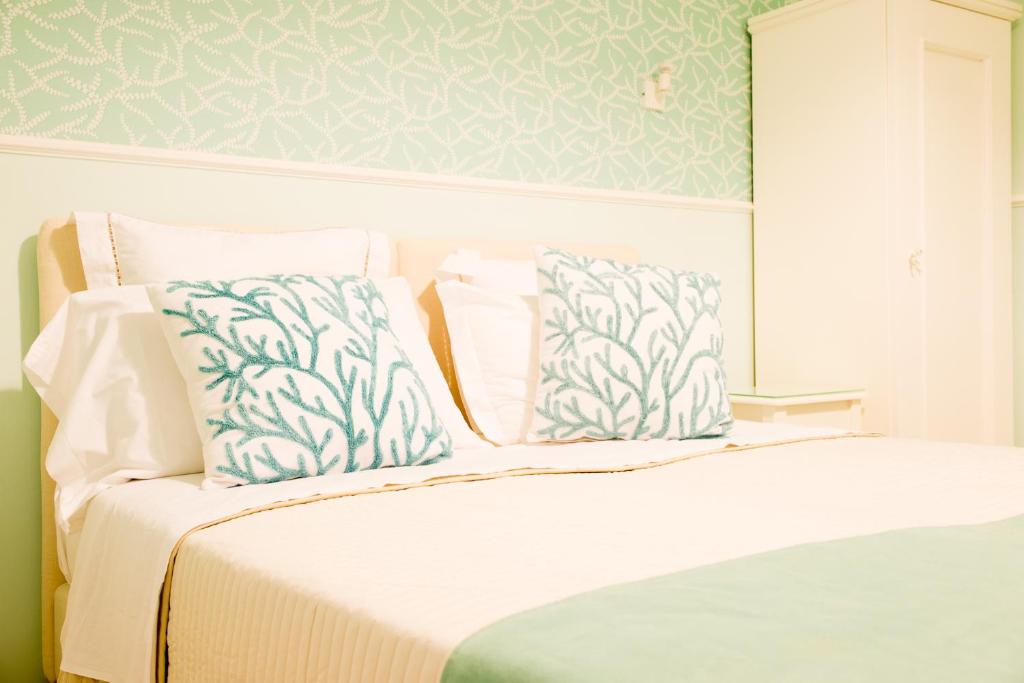 Postel nebo postele na pokoji v ubytování B&B Gioia Resort