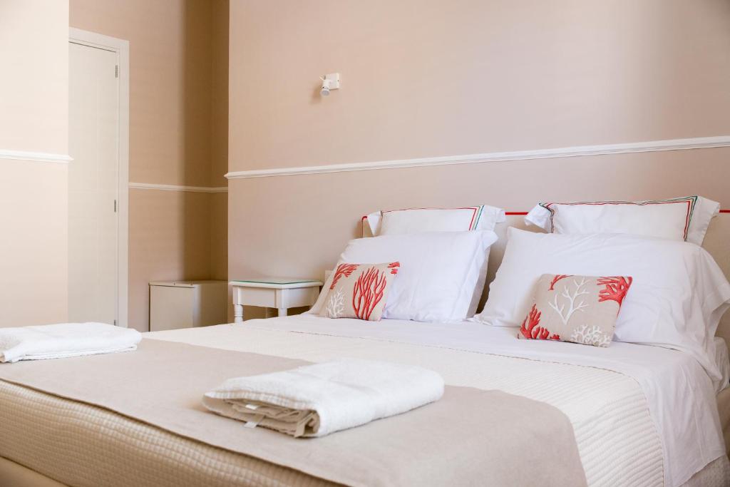 Postel nebo postele na pokoji v ubytování B&B Gioia Resort