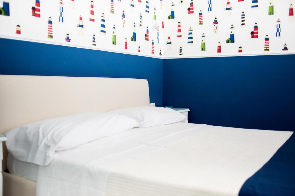 Postel nebo postele na pokoji v ubytování B&B Gioia Resort