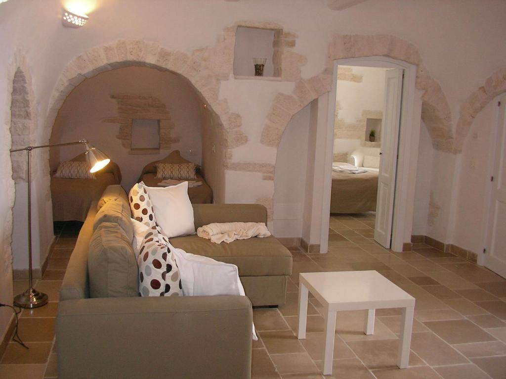 Posezení v ubytování Charming Trulli