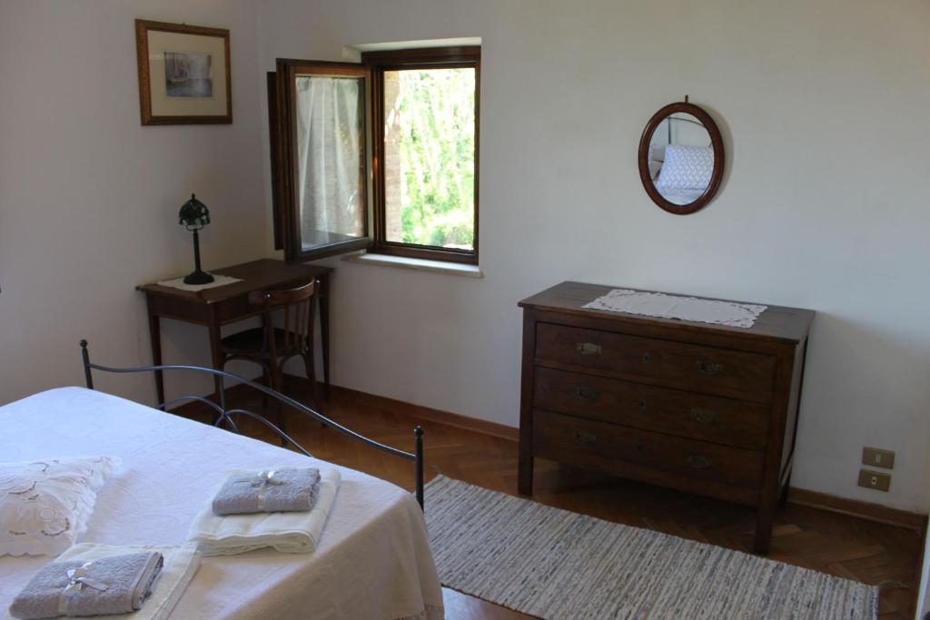 A bed or beds in a room at Vignano40