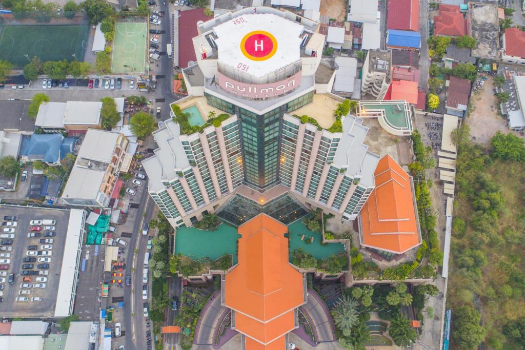 an overhead view of a building with a chinese sign on it at Pullman Khon Kaen Raja Orchid in Khon Kaen