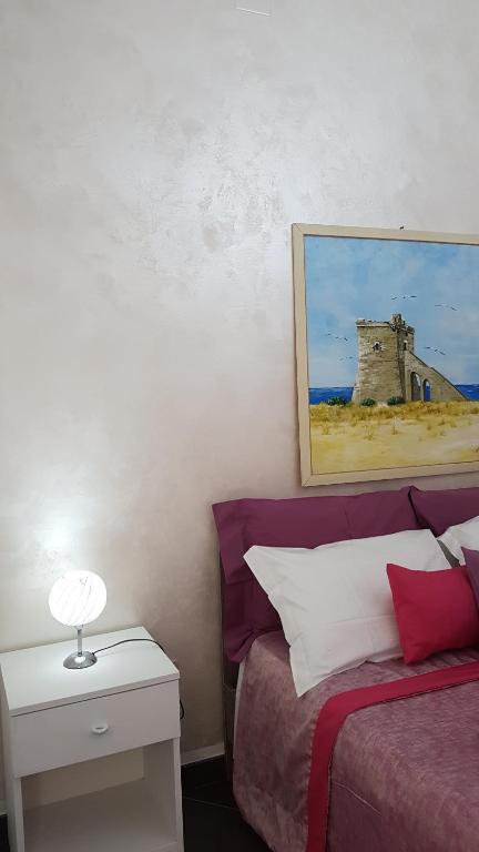 Postel nebo postele na pokoji v ubytování Baia Di Torre Squillace