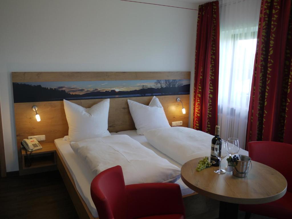 Postel nebo postele na pokoji v ubytování Hotel Seiserhof & Seiseralm