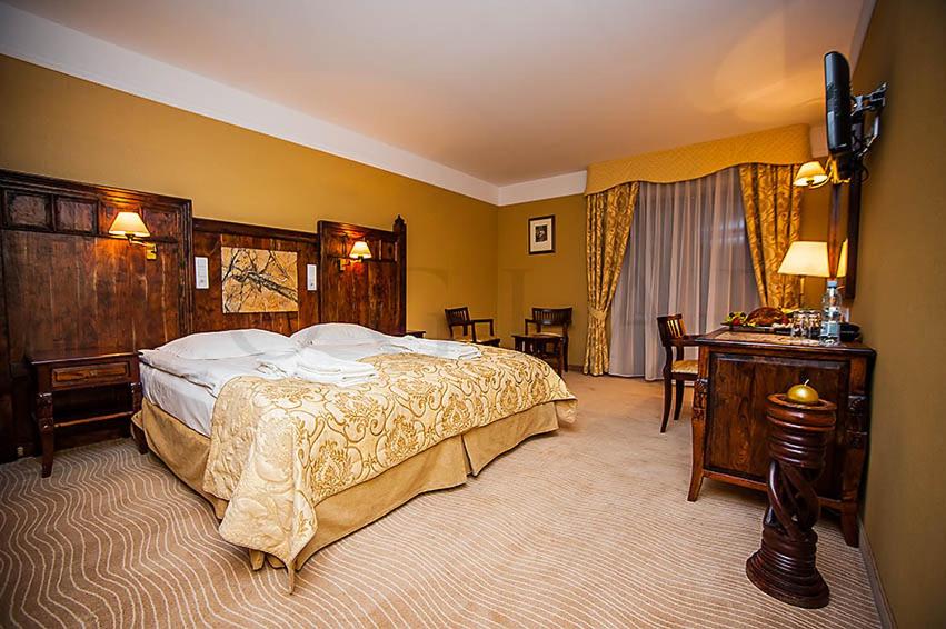 Posteľ alebo postele v izbe v ubytovaní SPA Hotel Splendor