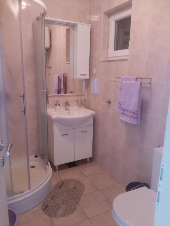 Kúpeľňa v ubytovaní Apartmani Lomar