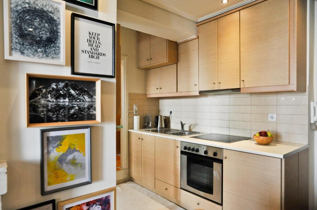 Kuchyň nebo kuchyňský kout v ubytování Agrinio ART Suites