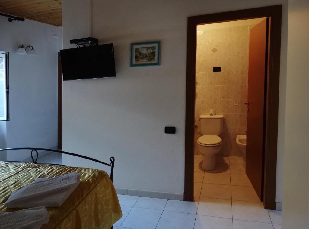 Postel nebo postele na pokoji v ubytování Affittacamere Graziella