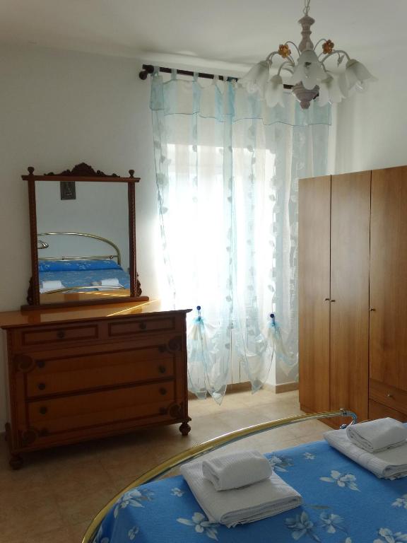 Postel nebo postele na pokoji v ubytování Affittacamere Graziella