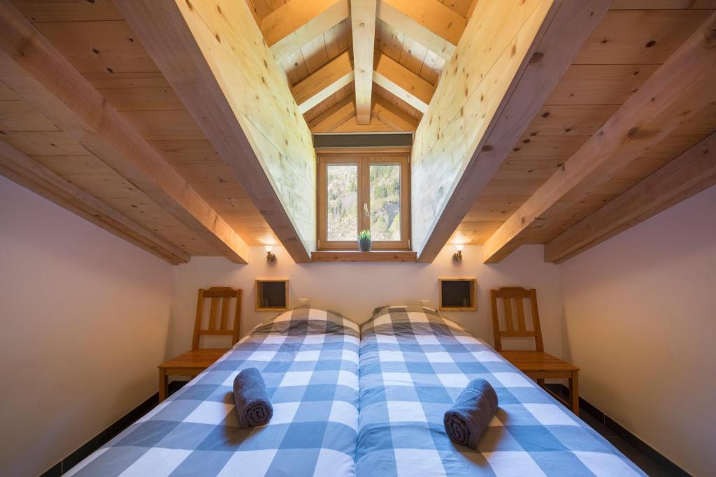 Postel nebo postele na pokoji v ubytování Ski and bike - holiday home Verbier Valley