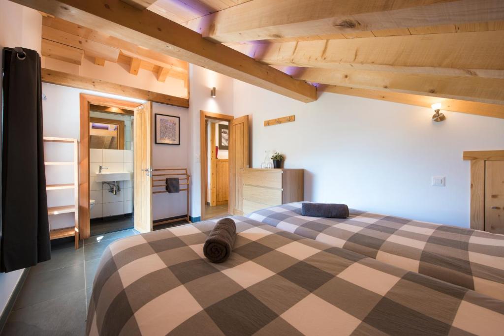 Postel nebo postele na pokoji v ubytování Ski and bike - holiday home Verbier Valley