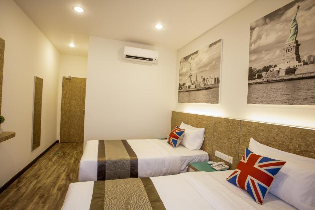 Postel nebo postele na pokoji v ubytování Natura Hotel