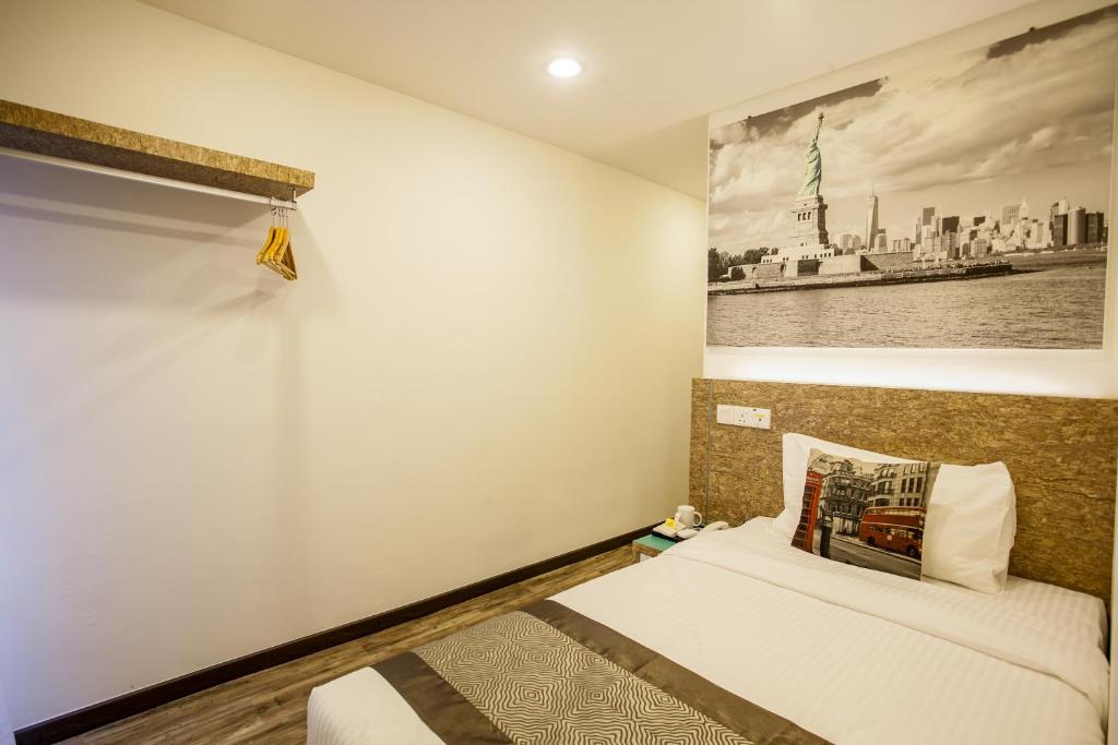 Postel nebo postele na pokoji v ubytování Natura Hotel