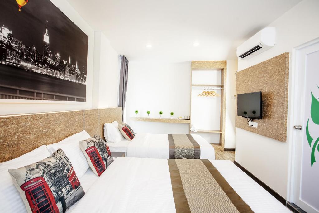 TV a/nebo společenská místnost v ubytování Natura Hotel