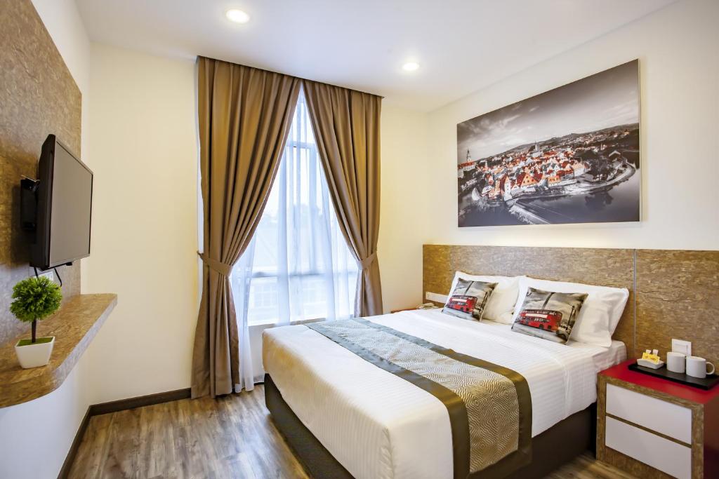 Postel nebo postele na pokoji v ubytování Natura Hotel