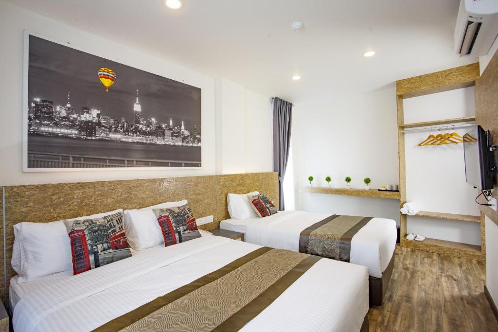 Postel nebo postele na pokoji v ubytování Natura Hotel