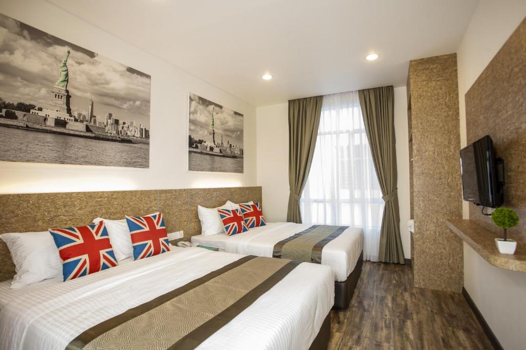 Postel nebo postele na pokoji v ubytování Natura Hotel