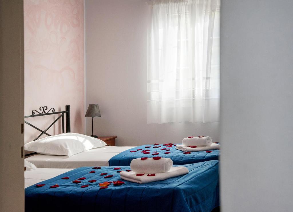 Postel nebo postele na pokoji v ubytování Pantonia Apartments