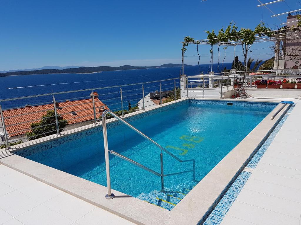 a swimming pool on top of a cruise ship at J&B Holiday House Hvar in Hvar