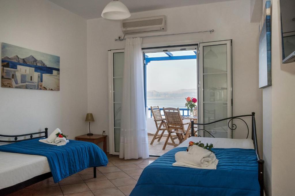 Postel nebo postele na pokoji v ubytování Pantonia Apartments