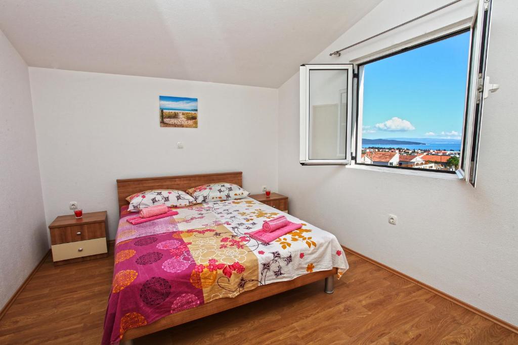 Postel nebo postele na pokoji v ubytování Apartments Ukic