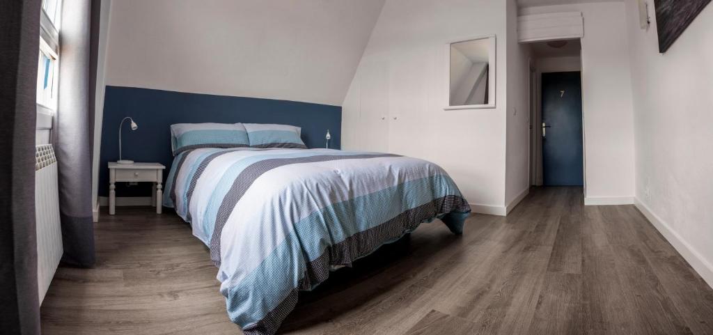 Posteľ alebo postele v izbe v ubytovaní H.A.N.D Surf Hostel