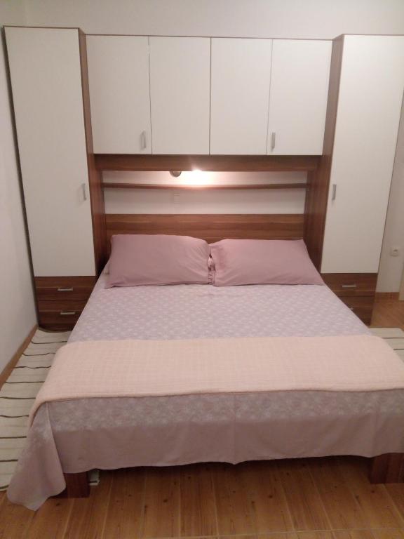 Posteľ alebo postele v izbe v ubytovaní Apartmani Lomar