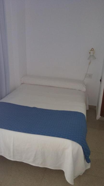 Postel nebo postele na pokoji v ubytování Plaça Vella