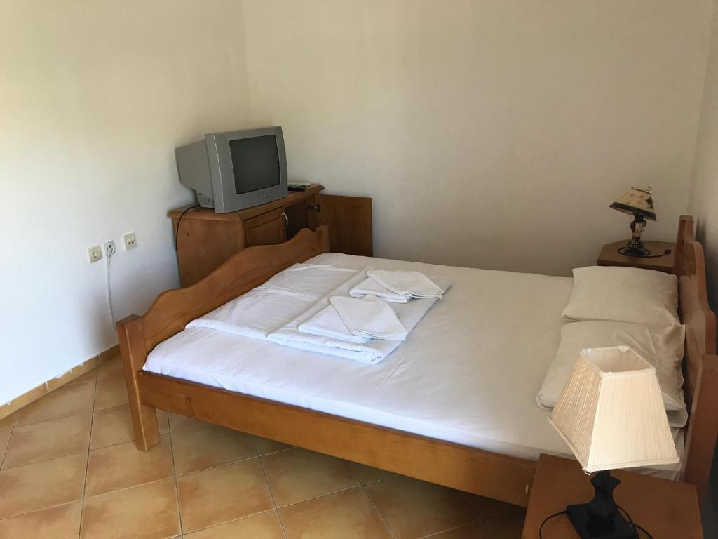 Postel nebo postele na pokoji v ubytování Apartments De Lara