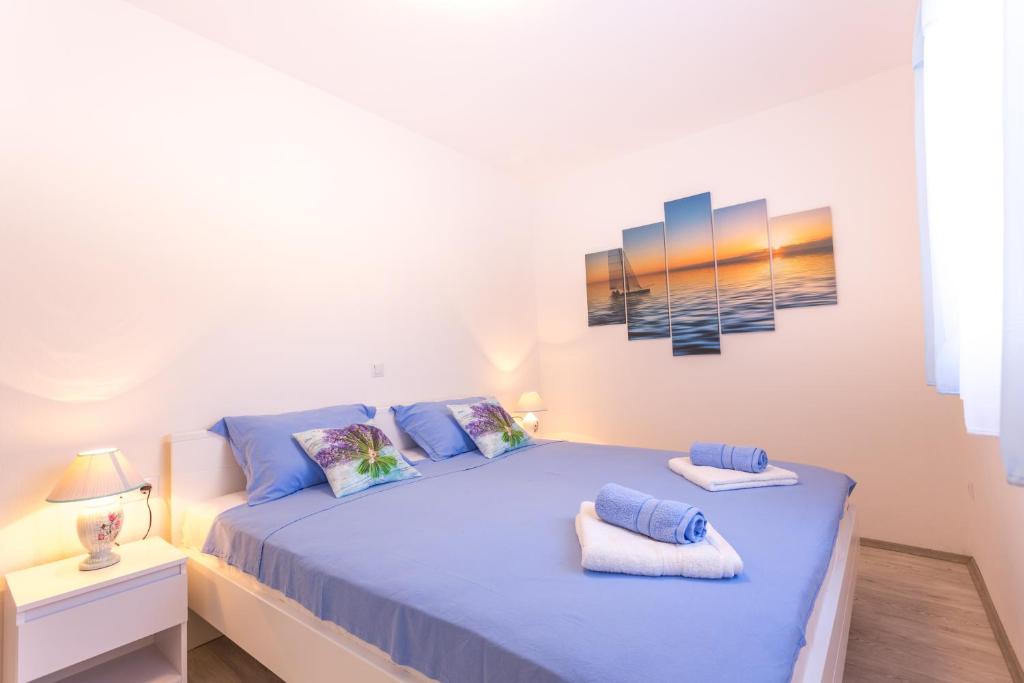 Posteľ alebo postele v izbe v ubytovaní Apartments Gabelic
