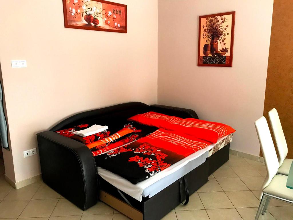 Łóżko lub łóżka w pokoju w obiekcie Princess Luxus Apartman