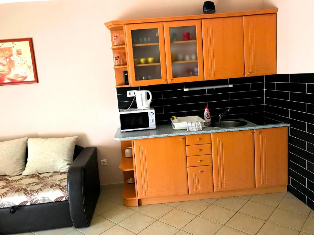Kuchnia lub aneks kuchenny w obiekcie Princess Luxus Apartman