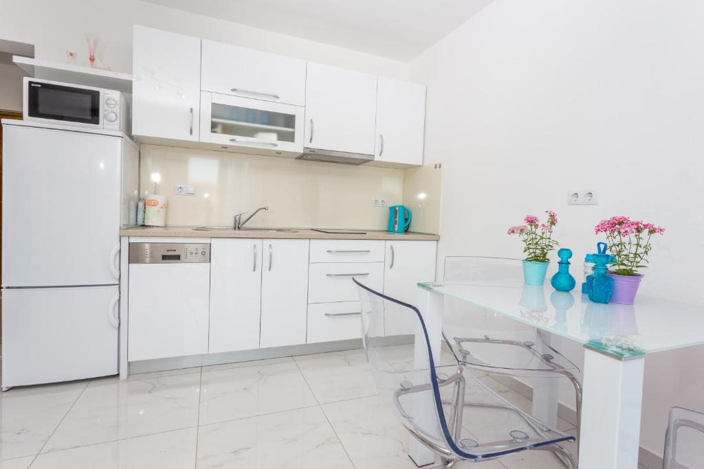 Kuchyňa alebo kuchynka v ubytovaní Apartments Gabelic