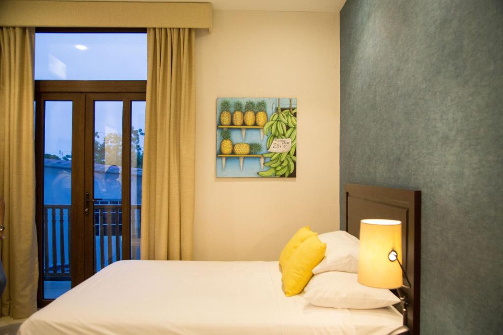 Una cama o camas en una habitación de Hotel Presidente Las Tablas