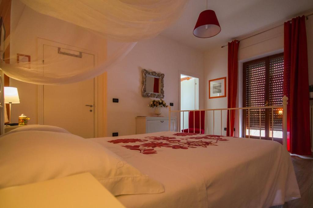 Postel nebo postele na pokoji v ubytování B&B Costa D'Abruzzo